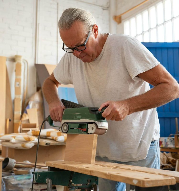 carpenter-working-on-wood-craft-at-workspace-producing-wooden-furniture-.jpg carpenter-working-on-wood-craft-at-workspace-producing-wooden-furniture-.jpg