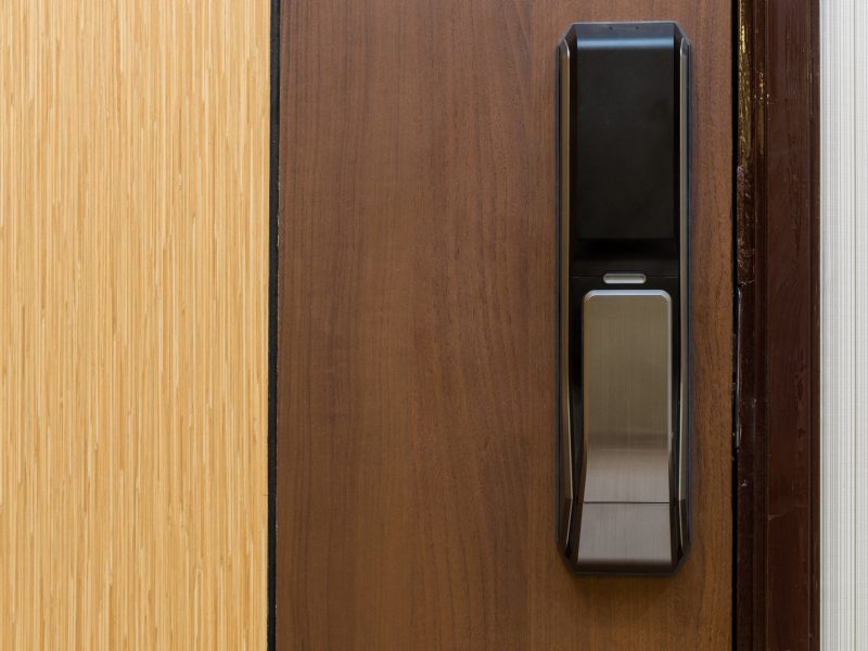 Digital door lock on wooden door